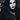 Close up portrait of a woman with dramatic dark eye makeup and black lashes